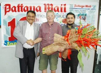 Martin Brands (centre), representing the Rotary Club of Jomtien-Pattaya presented a beautiful bouquet of flowers to Peter and Prince Malhotra recently to congratulate the Pattaya Mail on the historic occasion of reaching a milestone of our 1000th issue of the First and the Best English language newspaper in Pattaya.